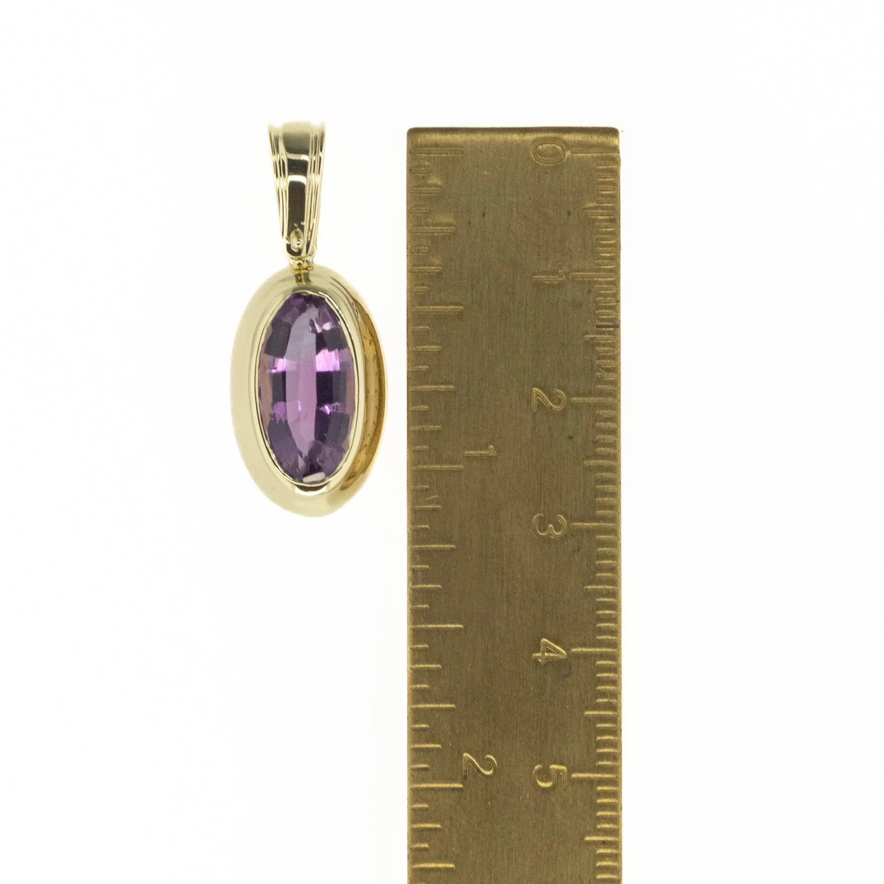 5.76ctw Oval Amethyst Solitaire in 18K Yellow Gold