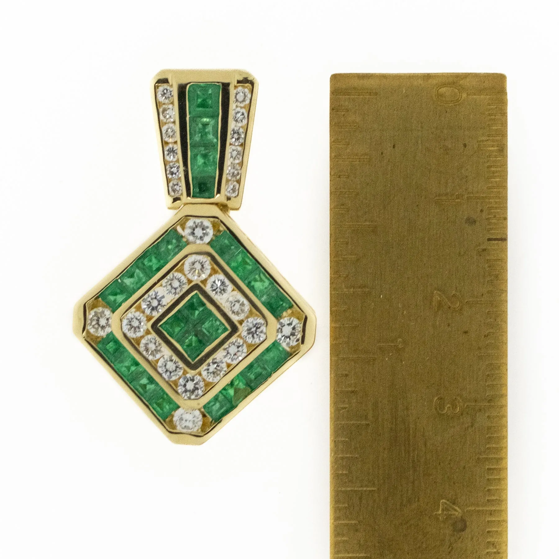Emerald & Diamond Accents Halo Pendant in 18K Yellow Gold